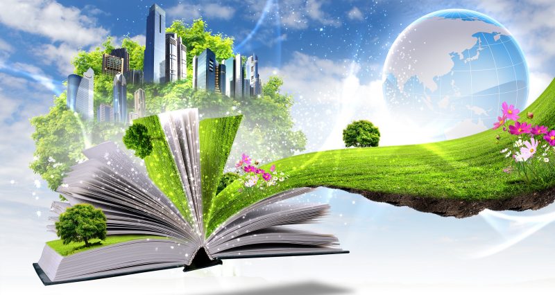 Open book with green nature world coming out of its pages